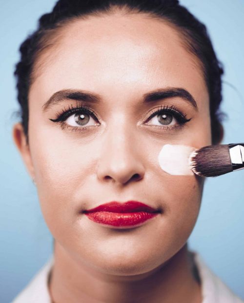 brushing-on-makeup